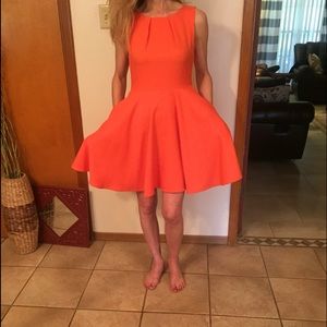 Super cute and flowy tangerine colored dress
